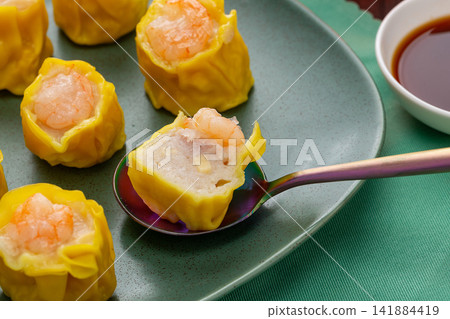 steamed open face shumai dumplings topped with succulent whole shrimp 141884419