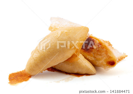 pan fried cornmeal potstickers with crispy golden lace crust pan fried cornmeal potstickers with crispy golden lace crust 141884471