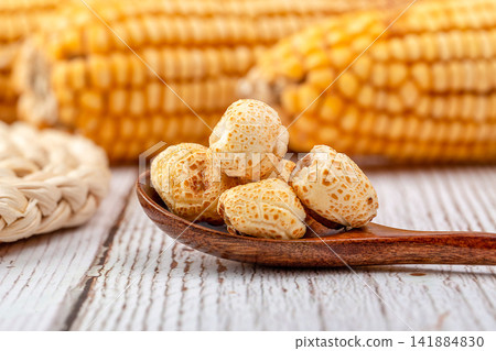 sweet caramel coated popcorn kernels for snack sweet caramel coated popcorn kernels for snack 141884830