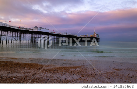 Brighton Pier at dawn. Brighton Pier at dawn. 141885668