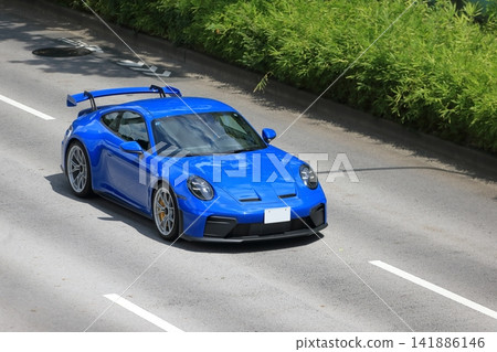 Image of a blue German-made sports car Image of a blue German-made sports car 141886146