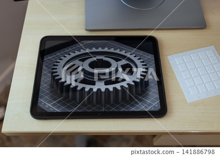 Tablet on a desk a 3d gear icon, with a keyboard nearby, representing settings, maintenance, and digital technology Tablet on a desk a 3d gear icon, with a keyboard nearby, representing settings, maintenance, and digital technology 141886798
