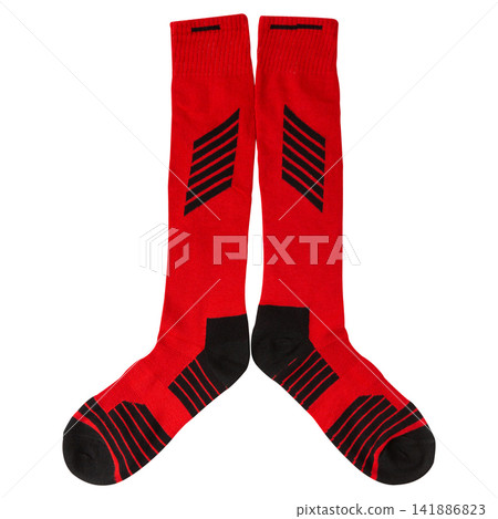Pair of red and black athletic football socks isolated on white background. High sports knee socks for soccer top view studio shot 141886823