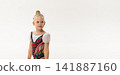 Portrait of child with cochlear implant during dance practice in studio. Banner with copy space. Hearing loss treatment, auditory rehabilitation, assistive medical device, emotional adaptation, and 141887160