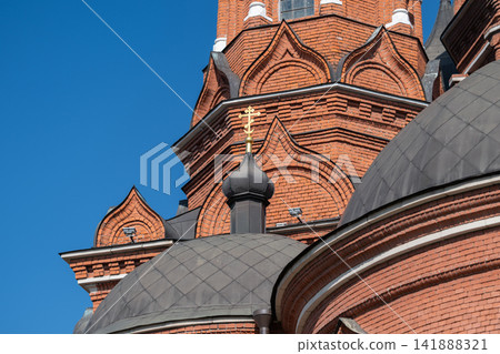 Majestic spires rise against the blue sky at Holy Assumption Cathedral in Tula Russia showcasing intricate architecture and rich history Majestic spires rise against the blue sky at Holy Assumption Cathedral in Tula Russia showcasing intricate architecture and rich history 141888321