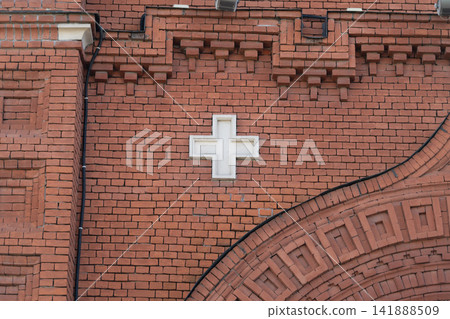 Stunning view of the Holy Assumption Cathedral's intricate brickwork and symbolic cross detail in Tula Russia capturing architectural beauty and historical significance Stunning view of the Holy Assumption Cathedral's intricate brickwork and symbolic cross detail in Tula Russia capturing architectural beauty and historical significance 141888509