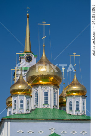 Glistening domes of the Cathedral of the Assumption shining under the blue sky in Tula Russia Glistening domes of the Cathedral of the Assumption shining under the blue sky in Tula Russia 141888863