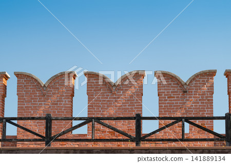 Exploring the architectural elegance of Tula Kremlin Museum's historic brick walls under a clear blue sky Exploring the architectural elegance of Tula Kremlin Museum's historic brick walls under a clear blue sky 141889134
