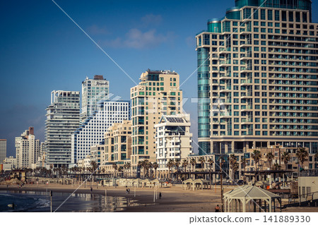 Modern hotel skyline and Mediterranean coastline seen from the Charles Clore promenade in Tel Aviv 141889330