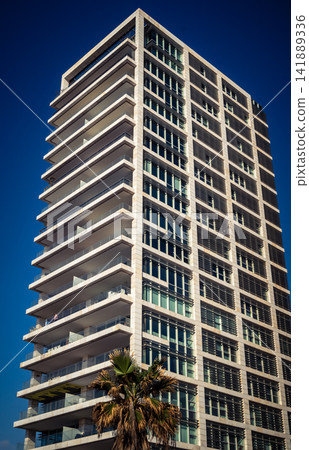 Modern hotel skyline and Mediterranean coastline seen from the Charles Clore promenade in Tel Aviv Modern hotel skyline and Mediterranean coastline seen from the Charles Clore promenade in Tel Aviv 141889336