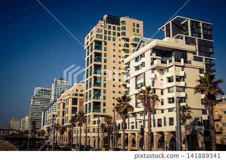 Modern hotel skyline and Mediterranean coastline seen from the Charles Clore promenade in Tel Aviv Modern hotel skyline and Mediterranean coastline seen from the Charles Clore promenade in Tel Aviv 141889341