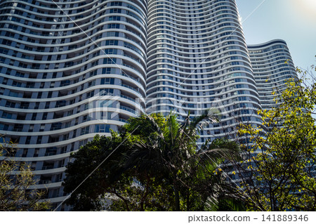Modern urban skyline featuring a dense cluster of high-rise corporate architecture in Tel Aviv Modern urban skyline featuring a dense cluster of high-rise corporate architecture in Tel Aviv 141889346