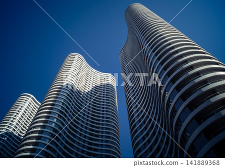 Modern urban skyline featuring a dense cluster of high-rise corporate architecture in Tel Aviv Modern urban skyline featuring a dense cluster of high-rise corporate architecture in Tel Aviv 141889368