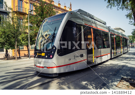 Seville Metrocentro tramway circulating through urban avenues in Andalusia Seville Metrocentro tramway circulating through urban avenues in Andalusia 141889412