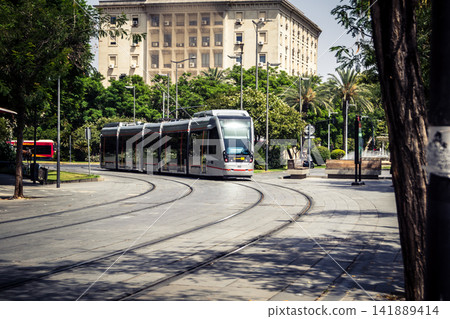 Seville Metrocentro tramway circulating through urban avenues in Andalusia Seville Metrocentro tramway circulating through urban avenues in Andalusia 141889414