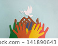 Colored paper hands reach out to a paper dove of peace on a blue background. World Peace Day. 141890643
