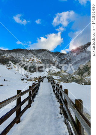 Scenic volcanic valley Jigokudani with sulfur vents hot springs and snow in Noboribetsu Japan Scenic volcanic valley Jigokudani with sulfur vents hot springs and snow in Noboribetsu Japan 141891480