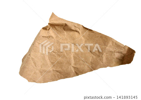 A crumpled piece of brown kraft paper with torn edges. 141893145