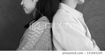 Image of a man and woman who are on bad terms (black and white) Image of a man and woman who are on bad terms (black and white) 141893285