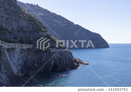 Via dell Amore path in Cinque Terre, Italy with long route built into steep coastal rock Via dell Amore path in Cinque Terre, Italy with long route built into steep coastal rock 141893791