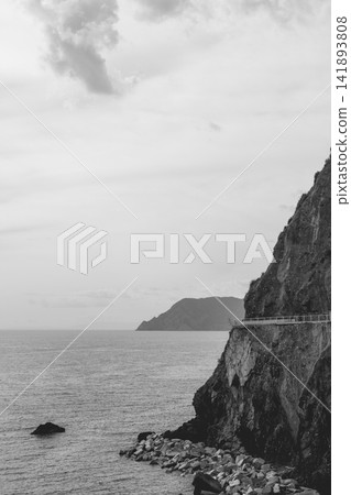 Via dell Amore on the Cinque Terre shoreline of Italy from telephoto coastal perspective Via dell Amore on the Cinque Terre shoreline of Italy from telephoto coastal perspective 141893808
