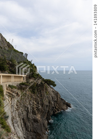 Via dell Amore within the Cinque Terre landscape of northern Italy with striated cliff Via dell Amore within the Cinque Terre landscape of northern Italy with striated cliff 141893809
