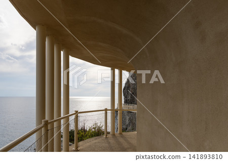 Via dell Amore within Cinque Terre in Italy with sweeping canopy curve and golden interior 141893810