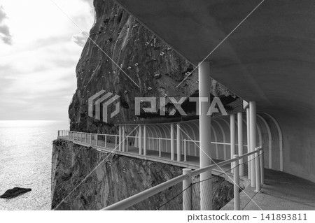 Via dell Amore walkway, Cinque Terre, Italy with monochrome geometric arches against raw rock Via dell Amore walkway, Cinque Terre, Italy with monochrome geometric arches against raw rock 141893811