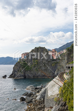 Manarola in Italy inside the Cinque Terre national park with shoreline-to-sky sweep Manarola in Italy inside the Cinque Terre national park with shoreline-to-sky sweep 141893816