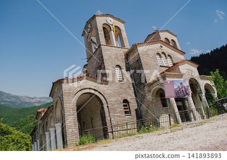 Leaning Panagia Theotokos stone church in abandoned sinking village of Ropoto after massive landslide disaster near Trikala Thessaly Greece stock photo Leaning Panagia Theotokos stone church in abandoned sinking village of Ropoto after massive landslide disaster near Trikala Thessaly Greece stock photo 141893893