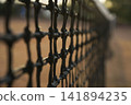 Tennis court net closeup 141894235