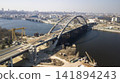 View top of the construction of the Podolsk-Voskresensky bridge in Kiev Ukraine March 2020 from a flight height 141894243