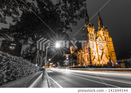 Gothic Cathedral at Night with Urban Light Trails Gothic Cathedral at Night with Urban Light Trails 141894544