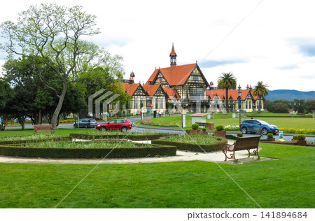 Historic Tudor Revival Building in Lush Park Garden Historic Tudor Revival Building in Lush Park Garden 141894684