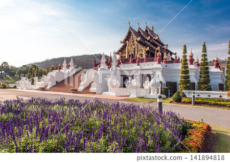 Thai Temple with Ornate Lanna Architecture and Flower Garden Thai Temple with Ornate Lanna Architecture and Flower Garden 141894818