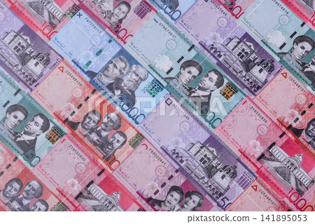 Dominican peso banknotes and coins as a instrument of trade and exchange. Dominican peso Dominican peso banknotes and coins as a instrument of trade and exchange. Dominican peso 141895053