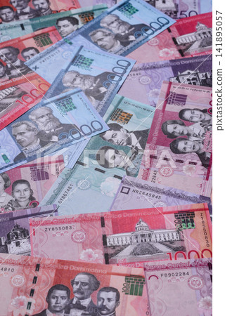 Dominican peso banknotes and coins as a instrument of trade and exchange. Dominican peso Dominican peso banknotes and coins as a instrument of trade and exchange. Dominican peso 141895057