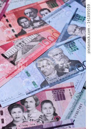 Dominican peso banknotes and coins as a instrument of trade and exchange. Dominican peso Dominican peso banknotes and coins as a instrument of trade and exchange. Dominican peso 141895059