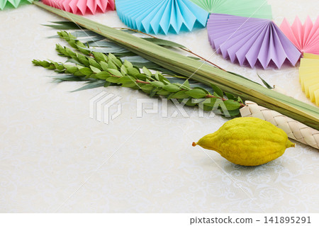 Sukkot four species set with festive decorations Sukkot four species set with festive decorations 141895291