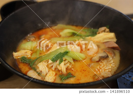 Steaming Hot Pot with Seafood and Vegetables Steaming Hot Pot with Seafood and Vegetables 141896510