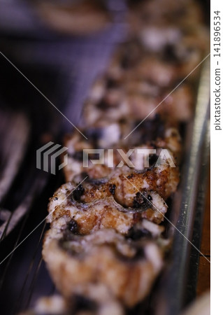 Grilled Food Close-Up with Charred Exterior Grilled Food Close-Up with Charred Exterior 141896534