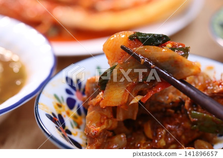 Korean Spicy Stir-Fried Dish with Chopsticks Korean Spicy Stir-Fried Dish with Chopsticks 141896657