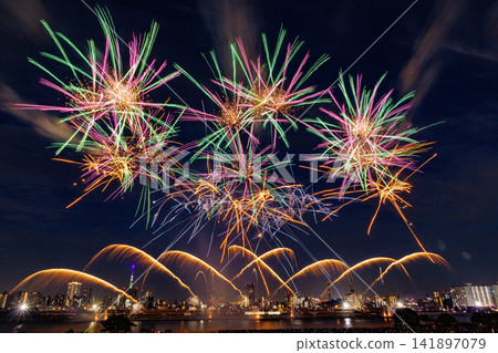 Colorful fireworks, a quintessential summer spectacle. Colorful fireworks, a quintessential summer spectacle. 141897079