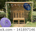 A rest area with wind chimes and bamboo blinds 141897146
