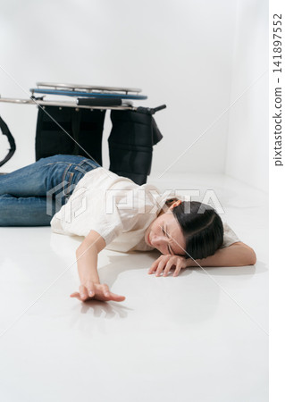 A woman who fell out of her wheelchair A woman who fell out of her wheelchair 141897552