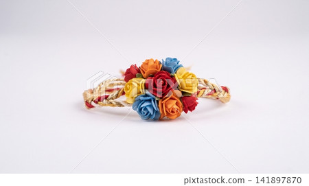 Decorative colorful braided friendship bracelet with mini flower cluster bracelet handmade accessory colorful wristband miniature decoration adornment close-up creative ornament botanical Decorative colorful braided friendship bracelet with mini flower cluster bracelet handmade accessory colorful wristband miniature decoration adornment close-up creative ornament botanical 141897870