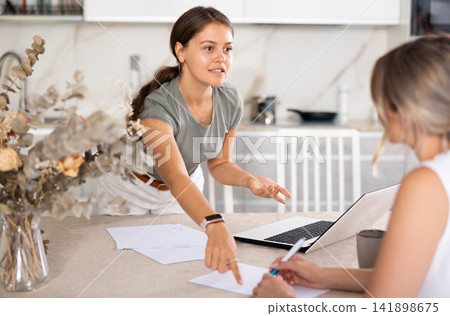 Girl agent communicates with client and makes deal with him Girl agent communicates with client and makes deal with him 141898675