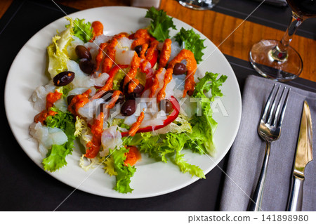 Traditional catalan salad Xatonada with crumbled cod Traditional catalan salad Xatonada with crumbled cod 141898980