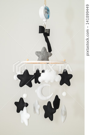Black and white felt baby crib mobile with stars, moon, and clouds nursery decoration 141899449