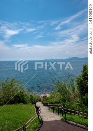 Nagasaki Prefecture / One of the four extremities of mainland Japan: Kanzaki-bana (Kanzaki-bana Park), the westernmost point of mainland Japan, where the contrast between fresh greenery and blue is beautiful. Nagasaki Prefecture / One of the four extremities of mainland Japan: Kanzaki-bana (Kanzaki-bana Park), the westernmost point of mainland Japan, where the contrast between fresh greenery and blue is beautiful. 141900509